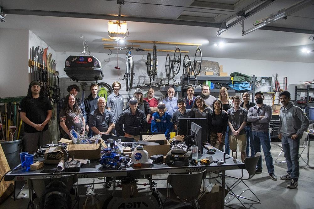 Left to right, front row – Joshua Fernando, Aaron Smith, Brady Williamson, Natalie Ayala, Trice Dayrit, Marc Frances, Dottie Metcalf-Lindenburger, Reid Wiseman, Steve Swanson, Karen Doty, Ben Villanueva. Back row – Nuha Akhtar, Stella Bristol, Chuck Burnell, Greg Whitney, Tom Voccola, Daniel Lambert, Akiah Tullis, Elias Willerup, Alex Smith, David Auner. Photo by Sean Evans